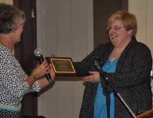 2018OPNConferencePhotos/HallieBakerPhDreceivingplaque.JPG